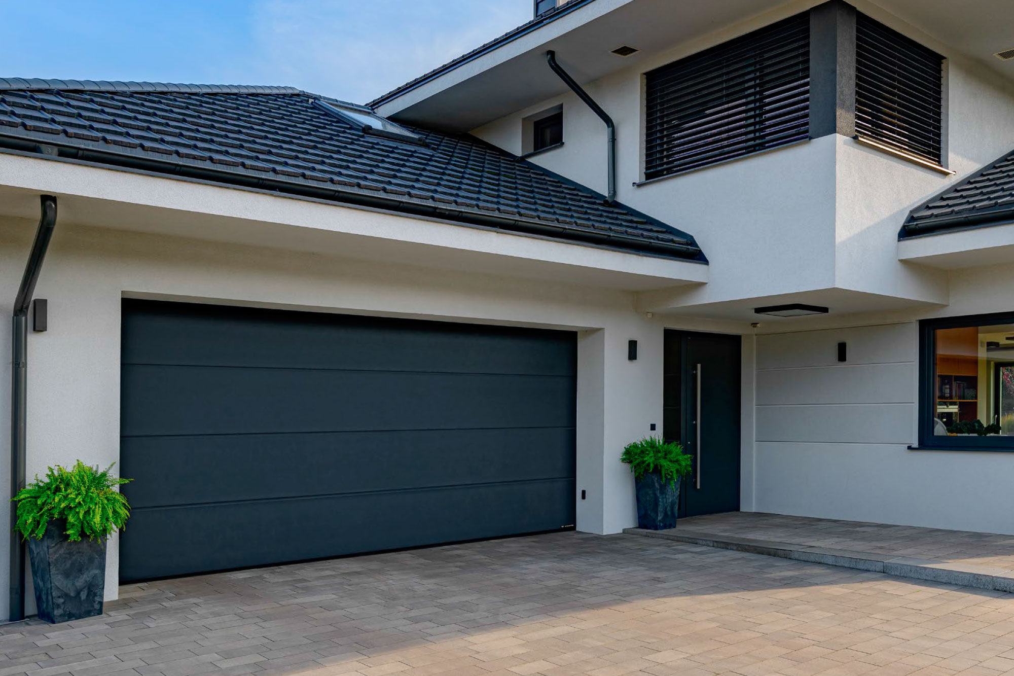 Modern black residential garage door